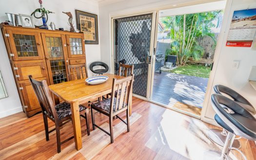 Stylish three-bedroom townhouse set in secure estate including pool, gym, and tennis court. Beautifully refurbished interior and landscaped private entertaining area.