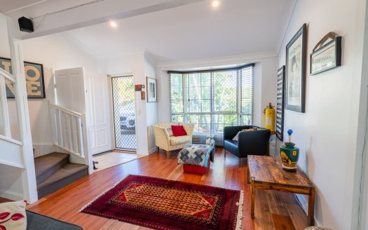 Stylish three-bedroom townhouse set in secure estate including pool, gym, and tennis court. Beautifully refurbished interior and landscaped private entertaining area.